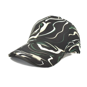 Close-up of a six-panel baseball cap featuring unique black and green marble print texture