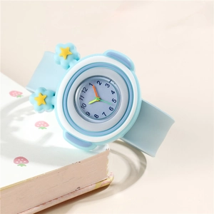 Light blue children's silicone quartz watch with 3D flower charms and jelly finish