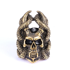 Gothic punk style skull and snake stainless steel ring in antique gold finish