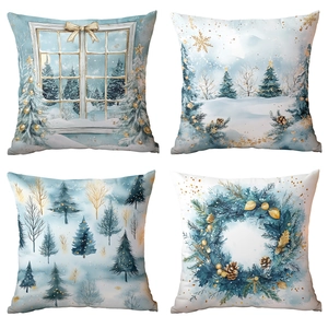 Set of four blue Christmas pillow covers with snow forest and festive wreath patterns