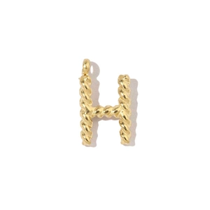 Detailed close-up of a 18k gold-plated letter H pendant with unique twisted rope texture