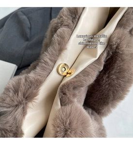 Detail of coffee brown faux fur tote bag with cream leather lining and gold magnetic closure