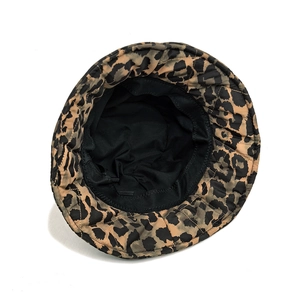 Close-up of leopard bucket hat interior showing breathable mesh lining and sweatband