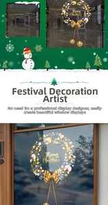 Detail showing a golden Christmas wreath window decal with Merry Christmas lettering