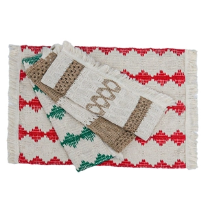 Macro detail of hand-woven cotton linen placemat with fringe and geometric patterns