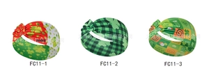 Detailed view of St. Patrick's Day headbands with shamrock and plaid printed patterns