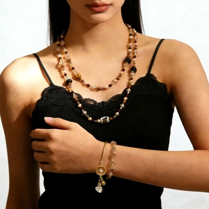 Retro multi-layer beaded necklace with burgundy and brown beads and heart charm bracelet