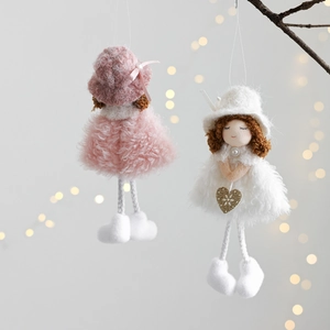 Christmas angel girl plush doll ornaments in pink and white hanging on tree branches
