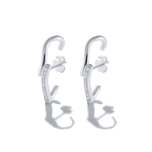 Detailed macro view of S925 sterling silver curved hoop earrings with sparkling cubic zirconia