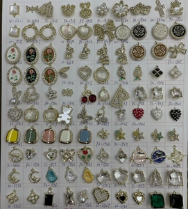Detailed grid display of mixed alloy enamel charms featuring fruit and animal shapes