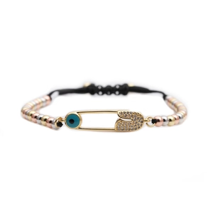 Adjustable safety pin bracelet with cubic zirconia evil eye and tricolor beads