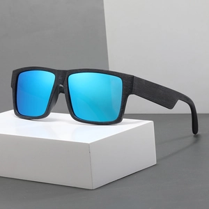 Polarized square sunglasses with blue mirrored lenses and black wood grain frame on white block