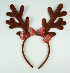 Detail of plush reindeer antlers headband with red gingham bows and tiny bells