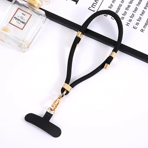 Detail of black nylon phone lanyard with gold metal clasp and T-shaped connector patch