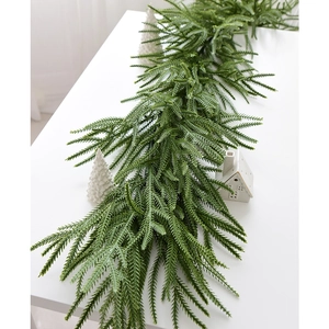 Deep green Norfolk pine garland for Nordic Christmas table and window decoration
