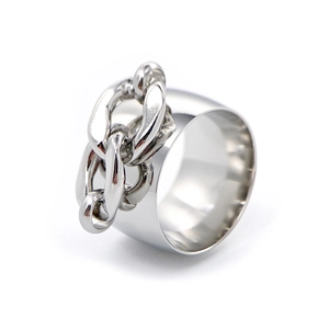 Close-up of polished stainless steel wide band ring with a chunky cuban link design