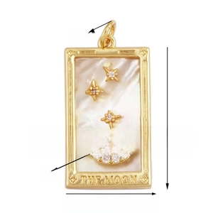 Macro detail of The Moon tarot card pendant with dimensions, shell inlay, and gold stars