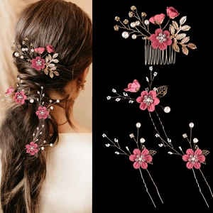 Detailed set of pink floral hair pins and comb with pearls and gold leaves for bridal hair