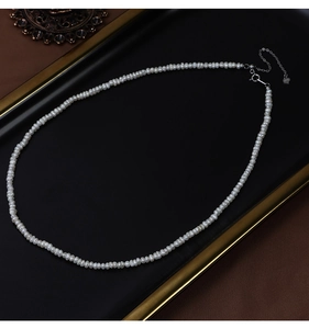 Detail of small natural freshwater baroque pearls with S925 adjustable silver clasp