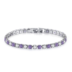 Detail view of silver tennis bracelet with alternating purple and white cubic zirconia stones