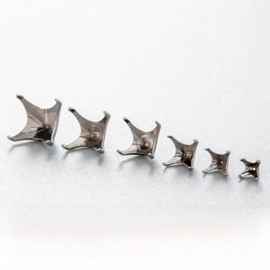 Detailed view of F136 titanium four-claw screw head settings for 3-8mm gemstones