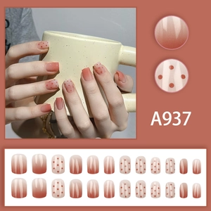 Red gradient and polka dot press-on nails set in square-oval shape with glossy finish