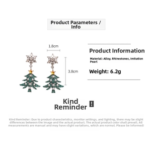 Detail of Christmas tree and snowflake earrings with rhinestones and faux pearls