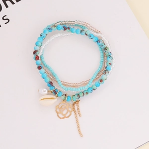Bohemian multilayer beaded bracelet with sea shells pearls and rose pendants