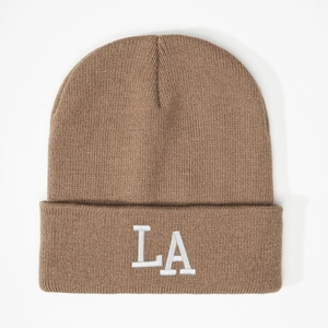 Close-up of premium 3D LA embroidery on warm brown ribbed knit winter beanie hat