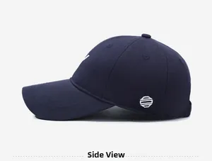 Side view of dark blue cotton baseball cap with white geometric embroidery detail