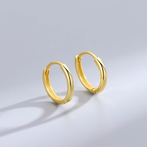 Minimalist S925 sterling silver hoop earrings with a polished golden finish and small round design