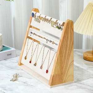Three-tier wooden jewelry stand with white velvet for necklace and ring display