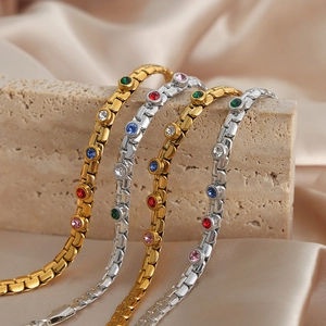Luxurious gold and silver plated chain bracelets featuring vibrant multi-color gemstones