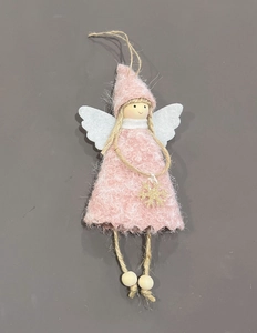 Detail of pink plush angel ornament with white wings and golden snowflake on grey background
