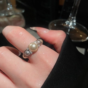 Vintage French open ring featuring circular pearls and cubic zirconia on a silver band