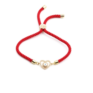 Bracelet tressé rouge avec cœur en zircon doré et pendentif œil bleu protecteur