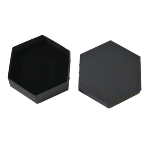 Elegant black hexagonal jewelry box with plush velvet insert for rings and necklaces