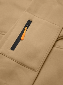 Detailed close-up of khaki sweatshirt with orange zipper pocket and soft fleece texture
