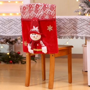 Detail of red plush Christmas chair cover with 3D snowman and golden snowflake embroidery