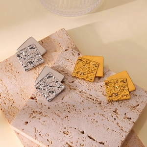 French vintage wrinkled texture square earrings in gold and silver finishes on stone