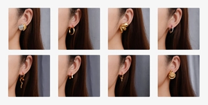 Close-up of stylish gold C-shaped steel bead earrings and geometric studs on model