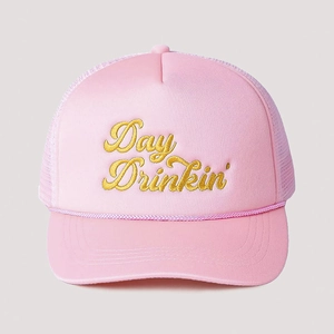 Detail of pink trucker hat with Day Drinkin' gold embroidery and mesh backing