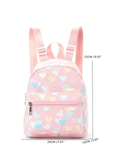 Pink quilted backpack with heart print showing dimensions 23cm height and 20cm length