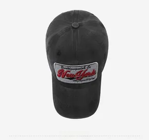 Top view of washed black vintage baseball cap featuring Brooklyn embroidery details