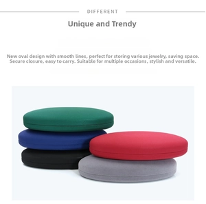Flat stack of oval PU leather jewelry storage boxes in five colors for necklaces