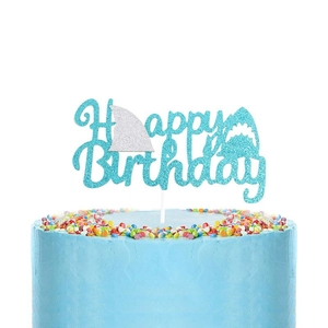 Glittery shark-themed Happy Birthday cake topper with silver fin and blue shark silhouette
