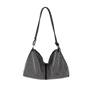 Sparkling black tote bag with silver rhinestones and knotted shoulder strap design