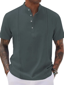 Detailed view of dark grey vertical texture fabric and multi-button placket on polo shirt