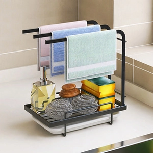 Detailed view of black metal kitchen organizer with dishcloth rails and drip tray
