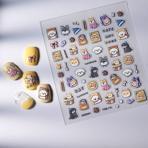 Detailed view of 3D embossed nail art stickers featuring cute cartoon cats and dogs